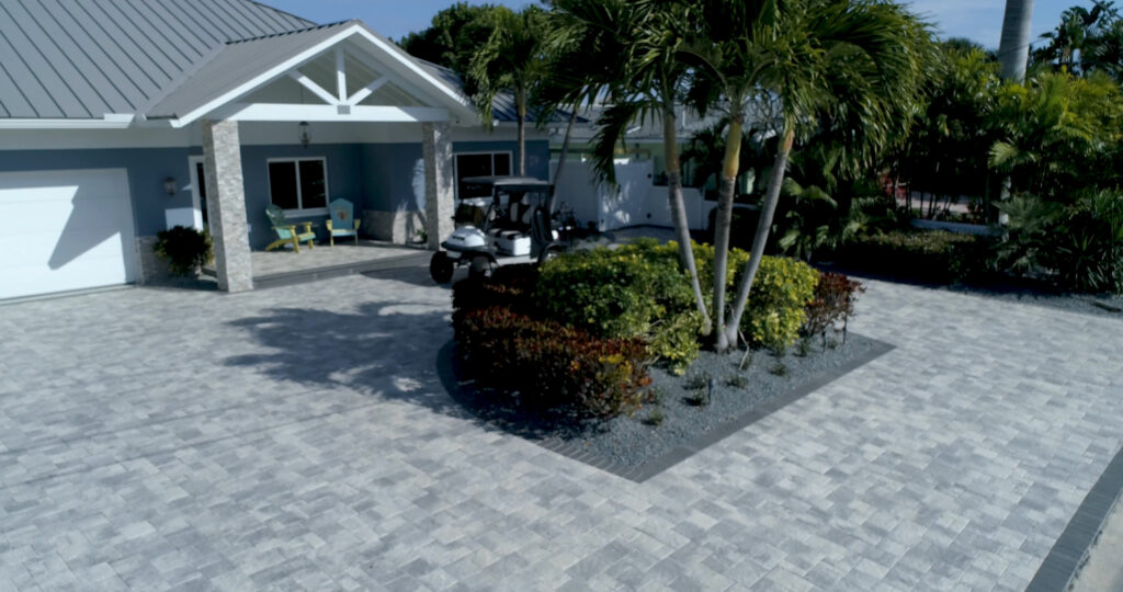 An image of a stone paved driveway with steps.
